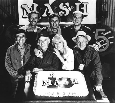 Cast with 10th year cake